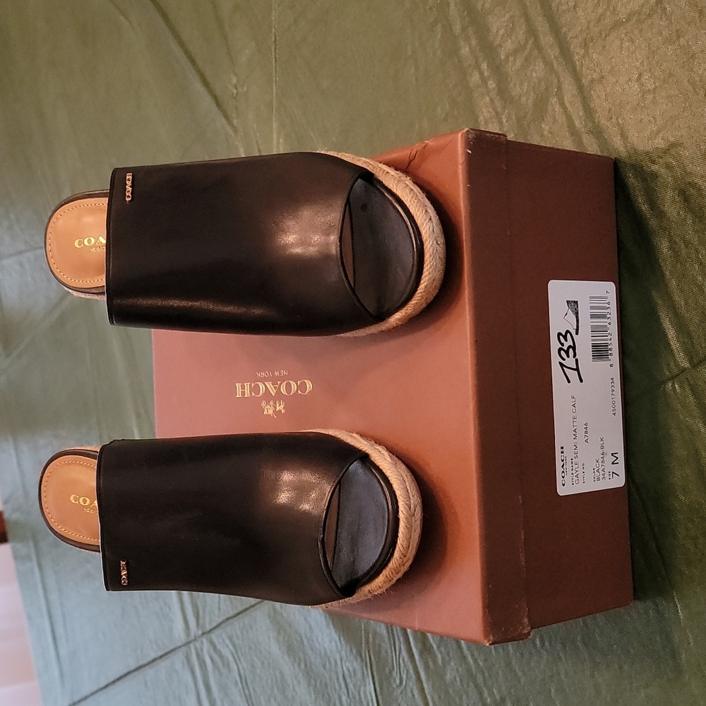 Black leather Coach sandals, size 7.